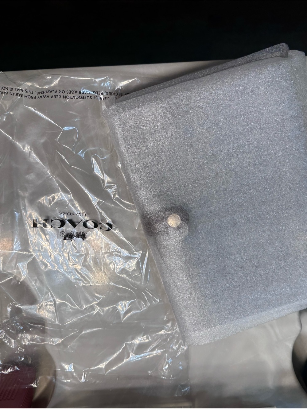 Coach Silver Tablet Sleeve with Snap Closure
